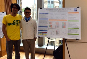 Lawrence with our summer undergraduate research fellow Sai Nimmagadda, as he presents his poster during the IGSP summer program.